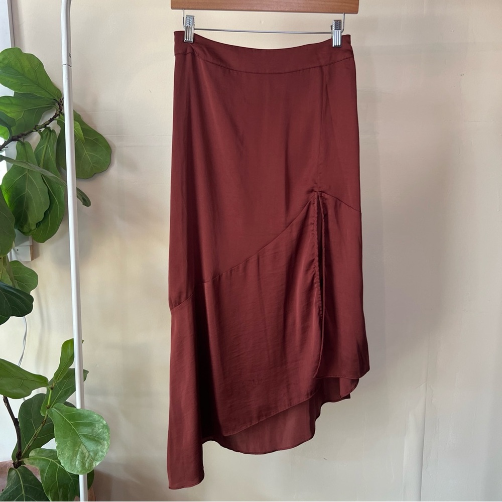 Free People Size 4 lightweight Rust satin midi skirt with asymmetrical hemline